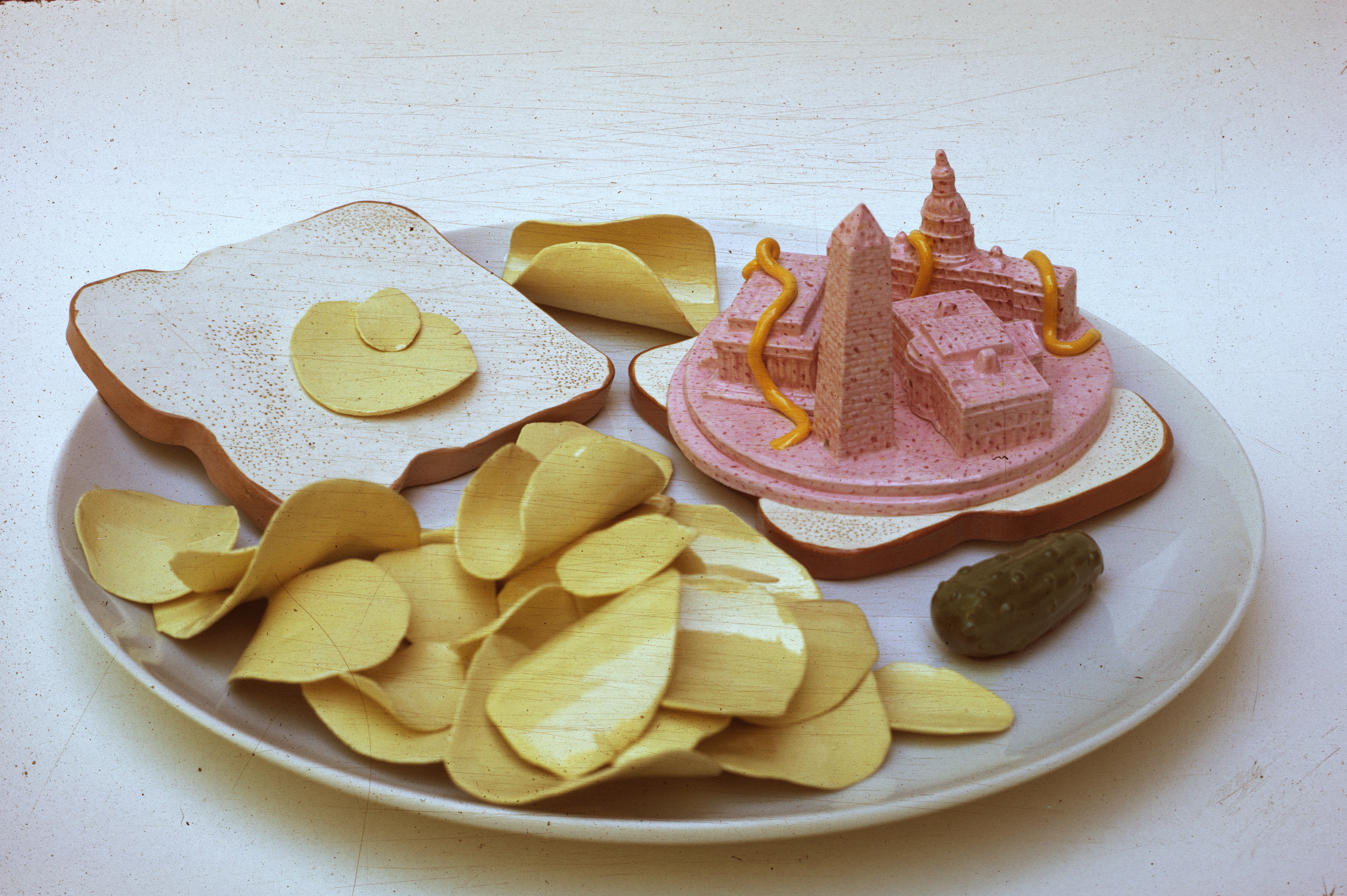 Washington Baloney, 1970, ceramic, glaze 3 x 12 x 12. Photo courtesy of Richard Notkin.